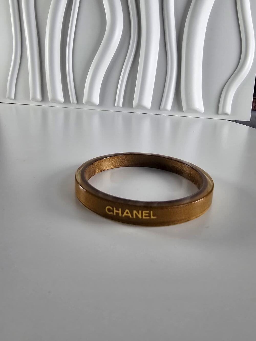 Chanel Amber Lucite Resin Gold Text Logo Bangle Bracelet